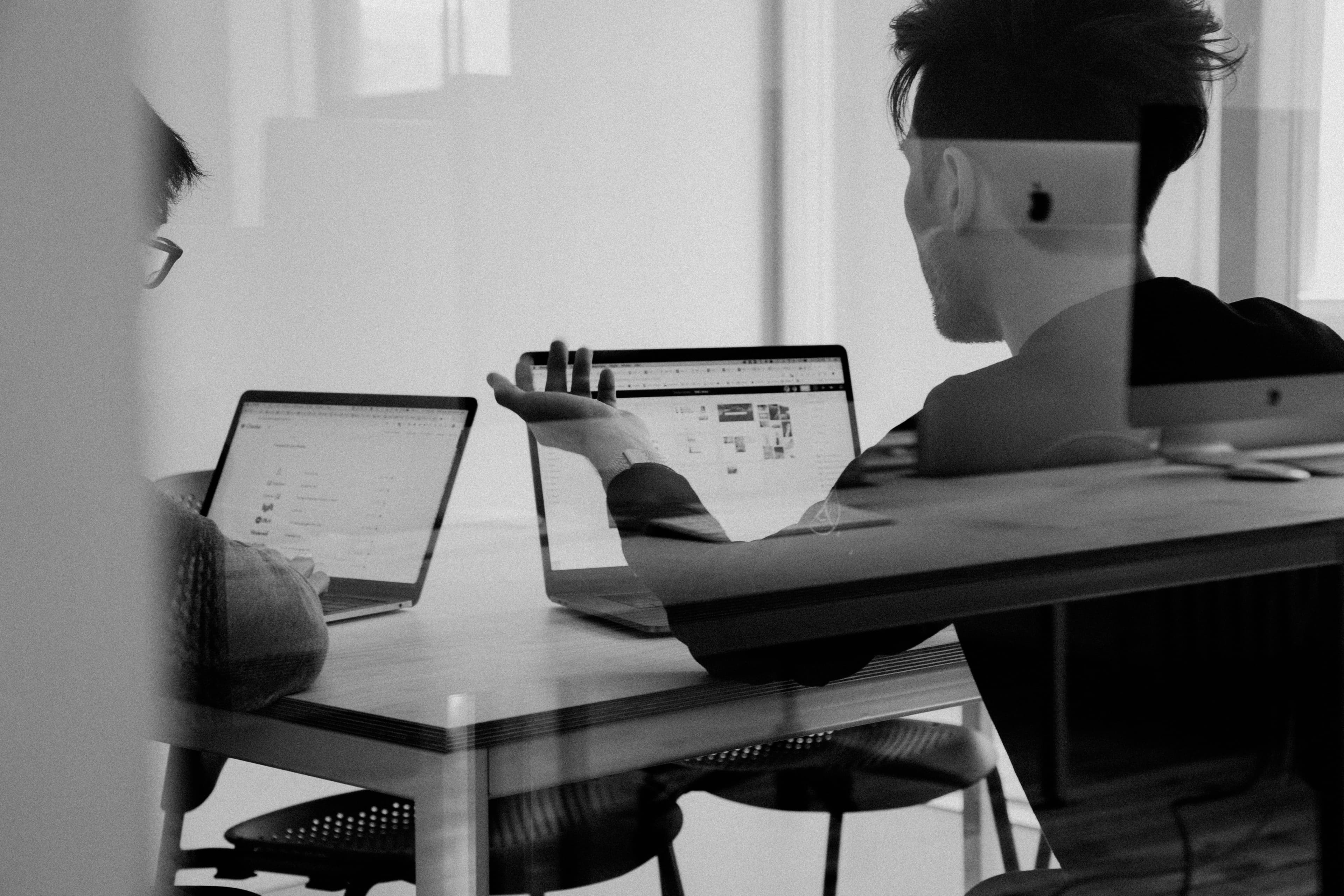 Romangic team working together at a shared desk